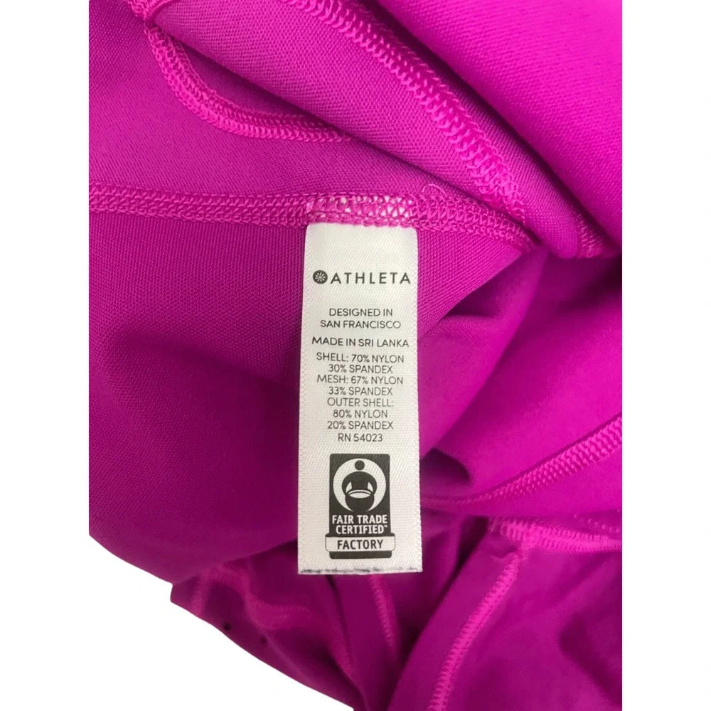 Athleta XL Fuschia Skort Pockets (two small‎ snags) See images